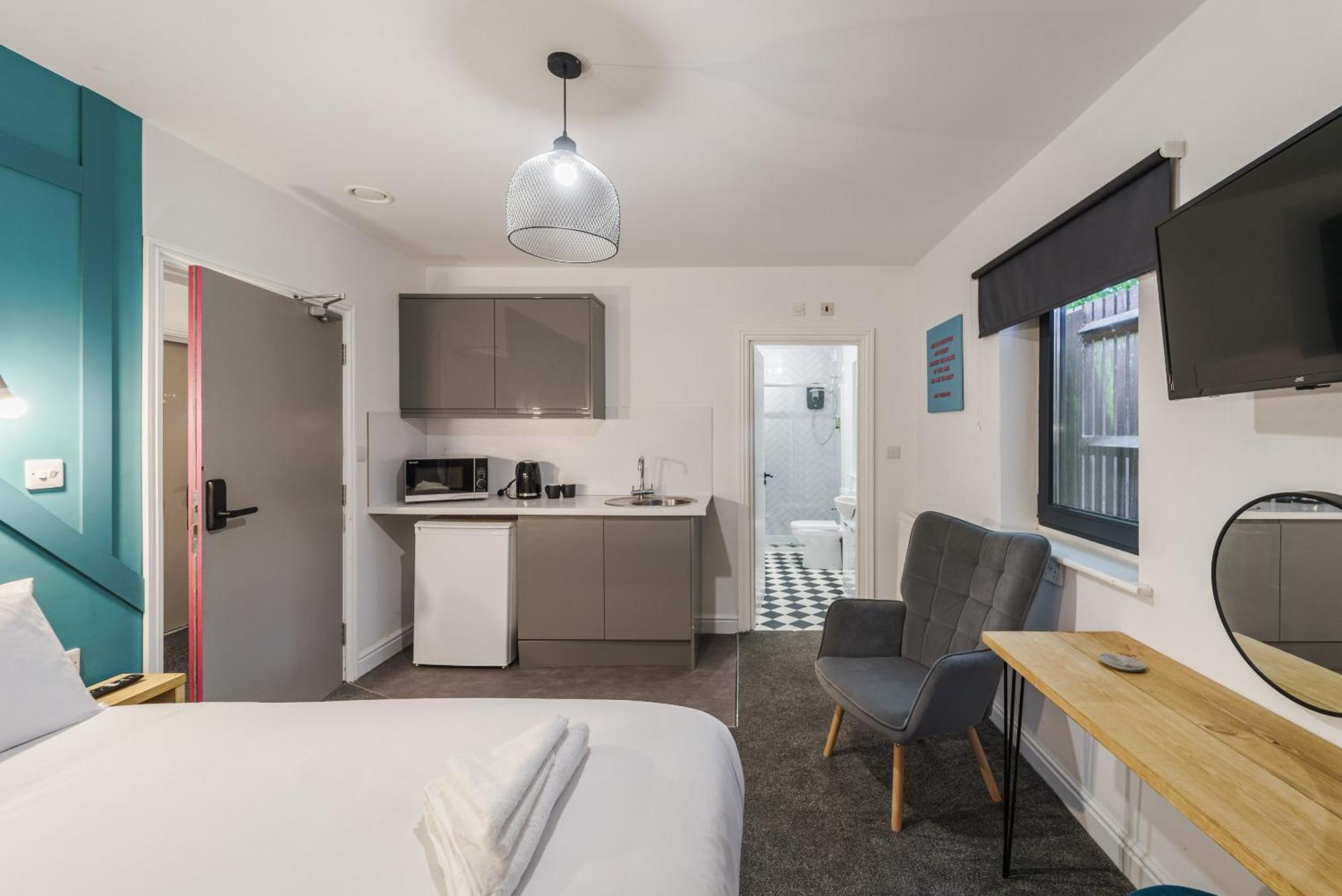 Deluxe Studio Apartments Дерби Номер фото